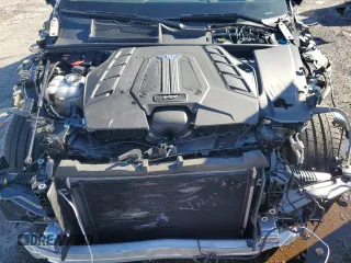 2022 Bentley Bentayga V8 z VIN SJAAM2ZV6NC016276, wystawiony jako Copart lot #39583644 z przebiegiem 5412 mil mil oraz . Historia ofert i sprzedaży dostępna na DreamBid. Obrazek 11.