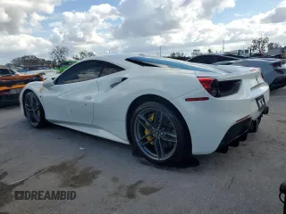 2016 Ferrari 488 z VIN ZFF79ALAXG0216223, wystawiony jako Copart lot #74210804 z przebiegiem Nie podano mil oraz Szkody całkowita. Historia ofert i sprzedaży dostępna na DreamBid. Obrazek 2.