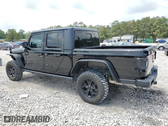 2023 Jeep Gladiator Sport S with VIN 1C6HJTAG9PL525183, listed as a Copart auction lot 54556735 with 13,805 mi miles and Salvage title. Bid and sale history available at DreamBid. Image 2.