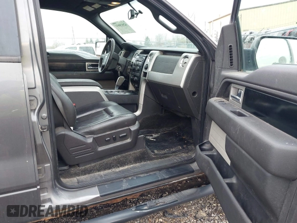 2011 Ford F-150 XLT with VIN 1FTFW1ET4BFC23725, listed as a IAAI auction lot 42018932 with 323,160 mi miles. Bid and sale history available at carsss.com. Image 5.