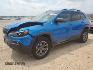 2020 Jeep Cherokee Trailhawk Elite z VIN 1C4PJMBN0LD633011, wystawiony jako Copart lot #54630225 z przebiegiem 71 166 mil mil oraz Szkoda całkowita • Salvage title. Historia ofert i sprzedaży dostępna na DreamBid. Obrazek 1.