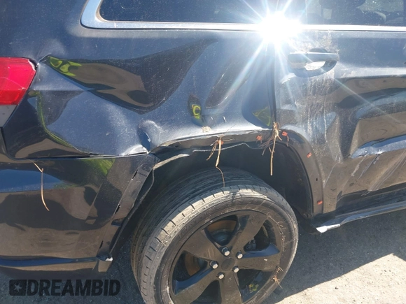 2014 Jeep Grand Cherokee Laredo with VIN 1C4RJEAG0EC580675, listed as a IAAI auction lot 41773879 with 127,714 mi miles. Bid and sale history available at carsss.com. Image 15.