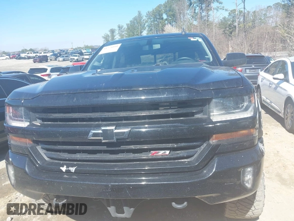 2017 Chevrolet Silverado 1500 LT with VIN 3GCUKREC1HG358752, listed as a IAAI auction lot 41775110 with 150,528 mi miles and . Bid and sale history available at DreamBid. Image 12.