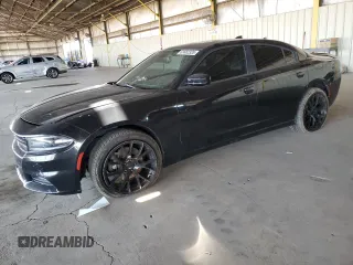 2015 Dodge Charger SXT with VIN 2C3CDXJG9FH748809, listed as a Copart auction lot 61682335 with 128,252 mi miles and Salvage title. Bid and sale history available at DreamBid. Image 1.