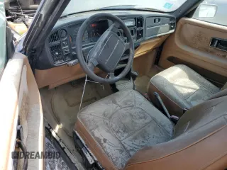 1991 Saab 900 z VIN YS3AK76E4M7018615, wystawiony jako Copart lot #65096243 z przebiegiem 35 109 mil mil oraz Szkoda całkowita • Salvage title. Historia ofert i sprzedaży dostępna na DreamBid. Obrazek 8.