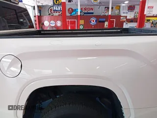 2022 Toyota Tundra SR with VIN 5TFKB5DAXNX006096, listed as a IAAI auction lot 42727998 with 44,389 mi miles and . Bid and sale history available at DreamBid. Image 2.