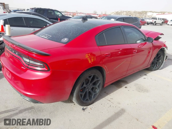 2015 Dodge Charger SXT with VIN 2C3CDXHG0FH827503, listed as a IAAI auction lot 41728214 with Not Provided miles and . Bid and sale history available at DreamBid. Image 4.
