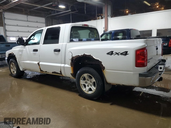 2005 Dodge Dakota SLT z VIN 1D7HW48K15S245809, wystawiony jako Copart lot #76278454 z przebiegiem 213 993 mil mil oraz Czysty tytuł • Clean title. Historia ofert i sprzedaży dostępna na DreamBid. Obrazek 2.