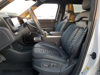 2023 Rivian R1S Adventure with VIN 7PDSGABAXPN004854, listed as a Copart auction lot 75369664 with 0 mi miles and Salvage Title. Bid and sale history available at carsss.com. Image 7.