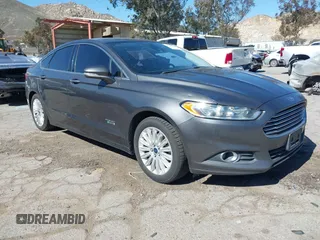 2016 Ford Fusion Energi SE Luxury with VIN 3FA6P0PU7GR304845, listed as a IAAI auction lot 41622108 with 147,174 mi miles. Bid and sale history available at carsss.com. Image 1.