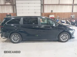 2023 Toyota Sienna XLE z VIN 5TDYRKEC5PS148076, wystawiony jako IAAI lot #42154673 z przebiegiem 169 197 mil mil oraz . Historia ofert i sprzedaży dostępna na DreamBid. Obrazek 13.