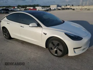 2022 Tesla Model 3 Long Range with VIN 5YJ3E1EB2NF201275, listed as a Copart auction lot 51952345 with 43,540 mi miles and Salvage Title. Bid and sale history available at DreamBid. Image 4.