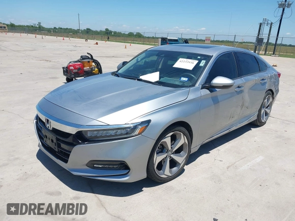 2019 Honda Accord Touring z VIN 1HGCV2F99KA002506, wystawiony jako IAAI lot #42233936 z przebiegiem 88 612 mil mil oraz . Historia ofert i sprzedaży dostępna na DreamBid. Obrazek 17.