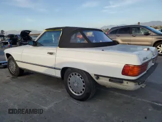 1989 Mercedes-Benz 560 Series 560SL with VIN WDBBA48D7KA100290, listed as a Copart auction lot 85049924 with 88,919 mi miles and Salvage Title. Bid and sale history available at carsss.com. Image 2.