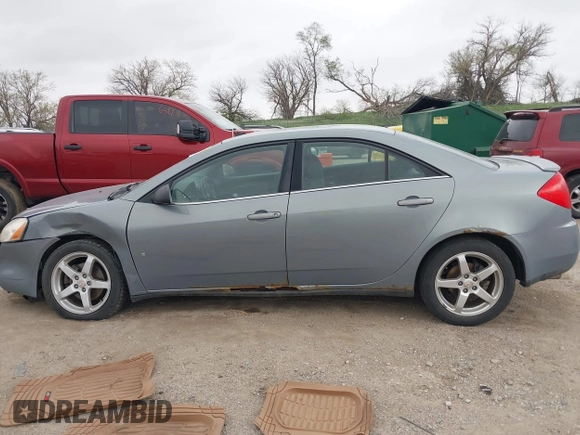2009 Pontiac G6 GT 1SA with VIN 1G2ZH57NX94107761, listed as a IAAI auction lot 42138285 with 150,805 mi miles and . Bid and sale history available at DreamBid. Image 14.
