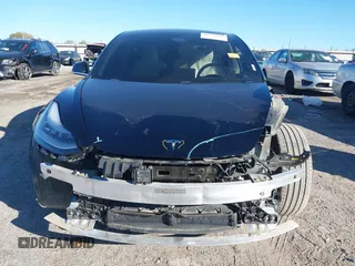 2020 Tesla Model 3 Standard Range Plus with VIN 5YJ3E1EA7LF802492, listed as a IAAI auction lot 40846048 with 36,488 mi miles and . Bid and sale history available at DreamBid. Image 13.