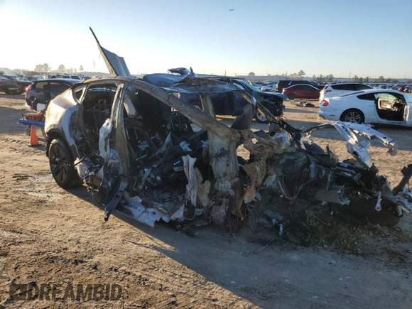 2024 Tesla Model Y with VIN 7SAYGDED6RA324943, listed as a Copart auction lot 43266965 with Not provided miles and Non repairable. Bid and sale history available at DreamBid. Image 4.