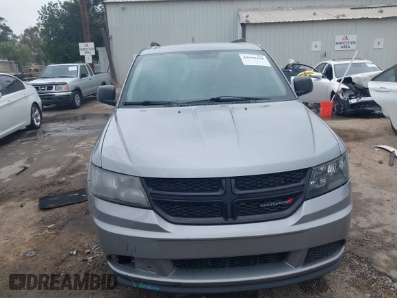 2018 Dodge Journey SE with VIN 3C4PDCAB1JT141295, listed as a IAAI auction lot 42098218 with 110,691 mi miles. Bid and sale history available at carsss.com. Image 12.