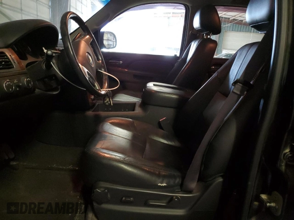 2013 Chevrolet Tahoe LT with VIN 1GNSKBE01DR288157, listed as a Copart auction lot 52665075 with 152,068 mi miles and Salvage Title. Bid and sale history available at DreamBid. Image 7.