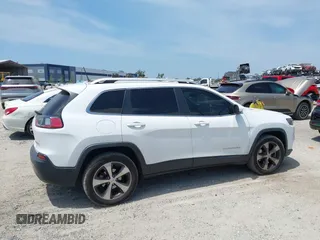 2019 Jeep Cherokee Limited with VIN 1C4PJLDB8KD402904, listed as a IAAI auction lot 42107306 with 96,677 mi miles and . Bid and sale history available at DreamBid. Image 13.