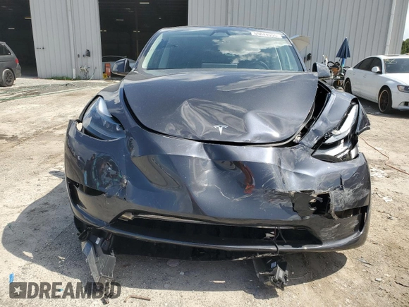 2024 Tesla Model Y Long Range z VIN 7SAYGDEE4RA251337, wystawiony jako Copart lot #59844555 z przebiegiem 16 011 mil mil oraz Szkoda całkowita • Salvage title. Historia ofert i sprzedaży dostępna na DreamBid. Obrazek 5.