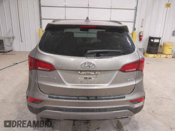 2017 Hyundai Santa Fe 2.4L z VIN 5XYZUDLBXHG447389, wystawiony jako IAAI lot #42249551 z przebiegiem 178 084 mil mil oraz . Historia ofert i sprzedaży dostępna na DreamBid. Obrazek 17.