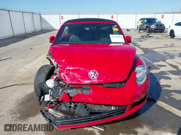 2013 Volkswagen Beetle 2.5L with VIN 3VW5P7AT1DM833048, listed as a IAAI auction lot 41769453 with Not Provided miles and . Bid and sale history available at DreamBid. Image 12.