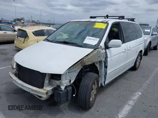 2003 Honda Odyssey EX-L with VIN 5FNRL18973B113215, listed as a IAAI auction lot 42052917 with Not Provided miles and . Bid and sale history available at DreamBid. Image 2.