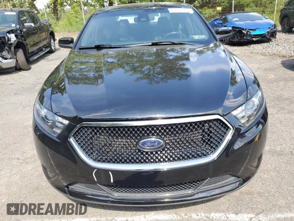 2017 Ford Taurus SHO z VIN 1FAHP2KT2HG137175, wystawiony jako Copart lot #63456505 z przebiegiem 72 402 mil mil oraz Szkoda całkowita • Salvage title. Historia ofert i sprzedaży dostępna na DreamBid. Obrazek 5.