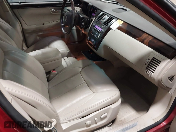 2009 Cadillac DTS w/1SA with VIN 1G6KD57Y59U149387, listed as a IAAI auction lot 41957750 with 94,939 mi miles. Bid and sale history available at carsss.com. Image 5.