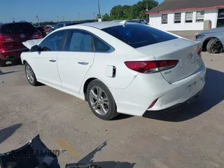 2018 Hyundai Sonata SEL with VIN 5NPE34AF1JH598725, listed as a IAAI auction lot 41988797 with 133,927 mi miles and . Bid and sale history available at carsss.com. Image 3.