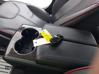 2014 Tesla Model S 60 with VIN 5YJSA1H17EFP30148, listed as a IAAI auction lot 39188024 with Not Provided miles and . Bid and sale history available at DreamBid. Image 11.