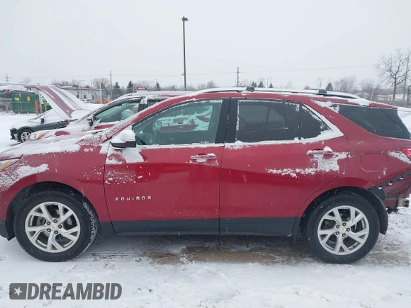 2021 Chevrolet Equinox Premier z VIN 2GNAXXEV4M6105996, wystawiony jako IAAI lot #41402065 z przebiegiem 51 083 mil mil oraz . Historia ofert i sprzedaży dostępna na DreamBid. Obrazek 15.