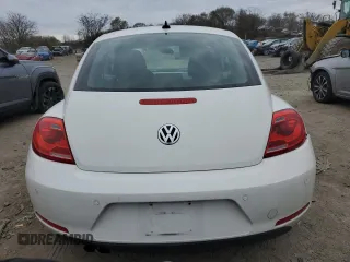 2014 Volkswagen Beetle 2.5L w/Sun with VIN 3VWJP7AT8EM621487, listed as a Copart auction lot 83106354 with 75,381 mi miles and Salvage Title. Bid and sale history available at DreamBid. Image 6.