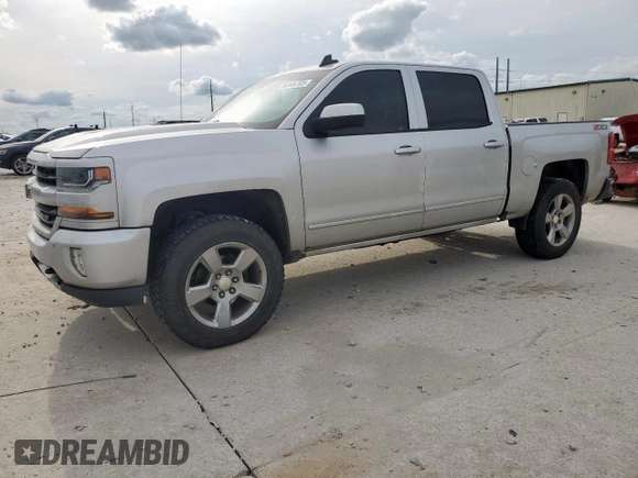 2018 Chevrolet Silverado 1500 LT with VIN 3GCUKREC3JG462083, listed as a Copart auction lot 56346705 with 166,454 mi miles and Clean Title. Bid and sale history available at DreamBid. Image 1.
