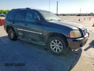 2003 GMC Envoy SLT z VIN 1GKDS13S332281271, wystawiony jako Copart lot #53685775 z przebiegiem 236 997 mil mil oraz Szkody całkowita. Historia ofert i sprzedaży dostępna na DreamBid. Obrazek 4.