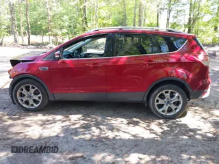 2014 Ford Escape Titanium with VIN 1FMCU9JX7EUB68165, listed as a IAAI auction lot 42141235 with 172,041 mi miles and . Bid and sale history available at DreamBid. Image 15.