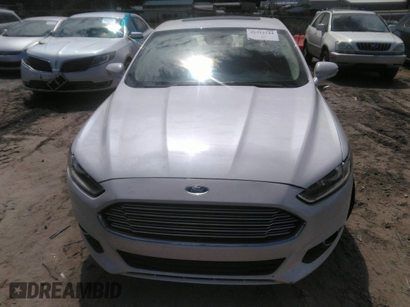 2016 Ford Fusion SE with VIN 3FA6P0H9XGR363785, listed as a IAAI auction lot 42312744 with 151,919 mi miles and . Bid and sale history available at DreamBid. Image 12.