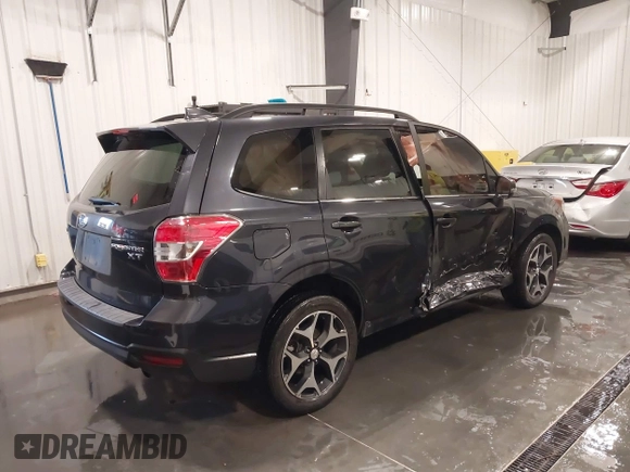 2016 Subaru Forester 2.0XT Touring with VIN JF2SJGXCXGH473366, listed as a IAAI auction lot 41846859 with 102,523 mi miles. Bid and sale history available at carsss.com. Image 4.