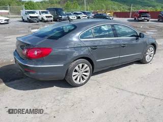 2012 Volkswagen CC Sport with VIN WVWMP7AN5CE502591, listed as a IAAI auction lot 42233995 with 73,756 mi miles and . Bid and sale history available at DreamBid. Image 4.