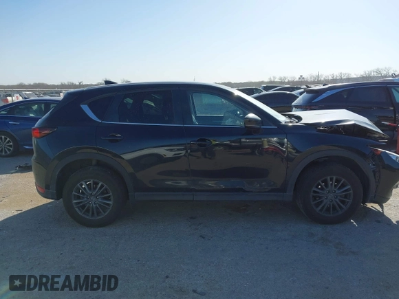2020 Mazda CX-5 Touring with VIN JM3KFACM0L0780265, listed as a IAAI auction lot 41825873 with 151,888 mi miles. Bid and sale history available at carsss.com. Image 13.