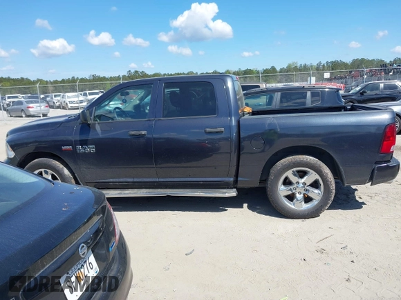 2018 Ram 1500 Express with VIN 1C6RR6KT1JS296814, listed as a IAAI auction lot 41870540 with 92,333 mi miles and . Bid and sale history available at DreamBid. Image 14.