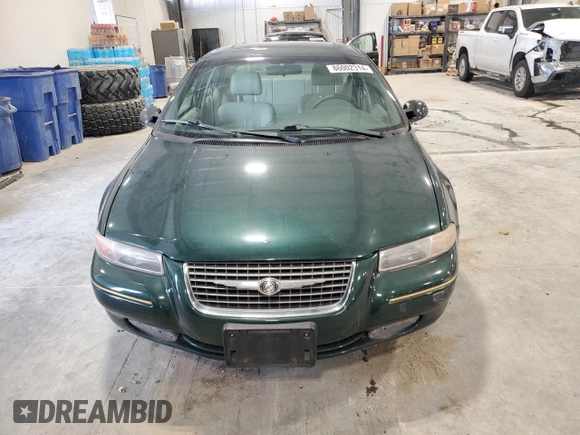 1999 Chrysler Cirrus LXi z VIN 1C3EJ56H6XN600228, wystawiony jako Copart lot #86002314 z przebiegiem 42 402 mil mil oraz Czysty tytuł • Clean title. Historia ofert i sprzedaży dostępna na DreamBid. Obrazek 5.