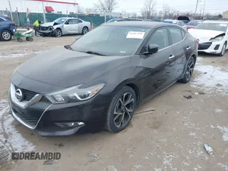2016 Nissan Maxima Platinum with VIN 1N4AA6AP6GC439654, listed as a IAAI auction lot 41387350 with 119,012 mi miles and . Bid and sale history available at DreamBid. Image 2.