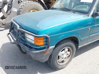 1994 Land Rover Discovery SD z VIN SALJY1247RA097510, wystawiony jako IAAI lot #42343474 z przebiegiem 137 141 mil mil oraz . Historia ofert i sprzedaży dostępna na DreamBid. Obrazek 6.