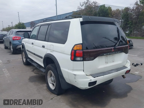 2000 Mitsubishi Montero LS z VIN JA4LS31H0YP021389, wystawiony jako IAAI lot #41443537 z przebiegiem 253 565 mil mil oraz . Historia ofert i sprzedaży dostępna na DreamBid. Obrazek 3.