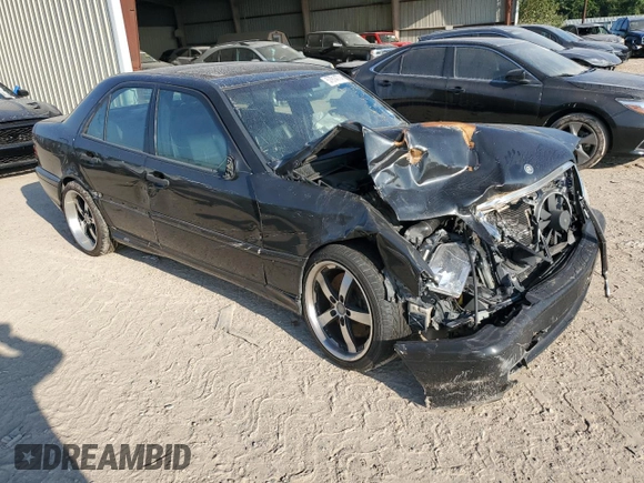 1999 Mercedes-Benz C z VIN WDBHA33E5XF777031, wystawiony jako Copart lot #57914774 z przebiegiem Nie podano mil oraz Szkoda całkowita • Salvage title. Historia ofert i sprzedaży dostępna na DreamBid. Obrazek 4.