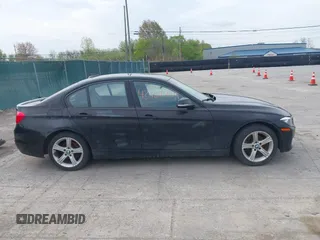 2015 BMW 3 Series 328i with VIN WBA3A5G57FNS87368, listed as a IAAI auction lot 42132939 with 115,289 mi miles. Bid and sale history available at carsss.com. Image 13.