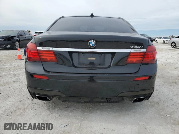 2015 BMW 7 Series 740i with VIN WBAYA6C50FD826727, listed as a Copart auction lot 82197433 with 241,799 mi miles and . Bid and sale history available at DreamBid. Image 6.