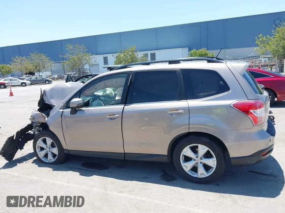 2014 Subaru Forester Touring with VIN JF2SJAPC3EH558690, listed as a IAAI auction lot 42588000 with 151,065 mi miles and . Bid and sale history available at DreamBid. Image 13.